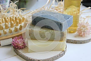 Handmade natural soap on wooden background. Spa natural treatments