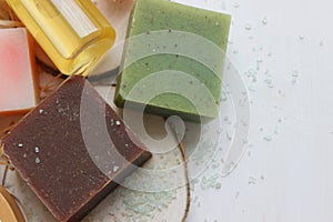 Handmade natural soap on wooden background. Spa natural treatments