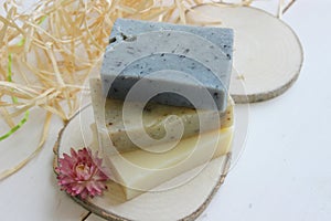 Handmade natural soap on wooden background. Spa natural treatments