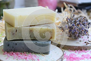 Handmade natural soap on wooden background. Spa natural treatments