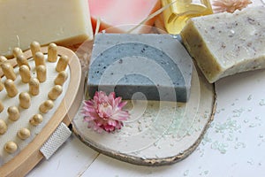Handmade natural soap on wooden background. Spa natural treatments