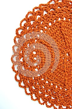 Handmade orange crochet doily photo