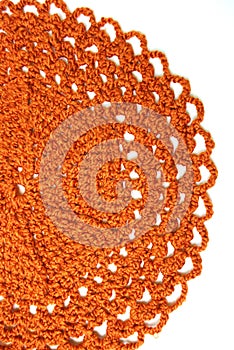 Handmade orange crochet doily photo