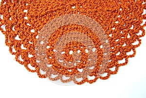 Handmade orange crochet doily