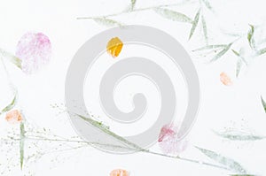 The Handmade recycled flower and leaf paper background