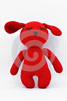 Handmade red teddy rabbit isolated on white background
