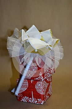 Handmade ribbon crown on a bezel