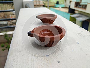 Handmade Sand Diya above the compound during Diwali Festival Celebration in India