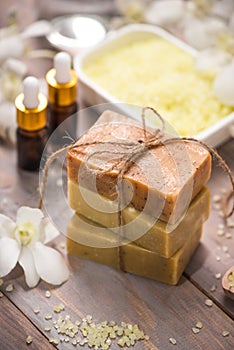 Handmade Soap and Aroma Oil with Flower branch. Spa products.