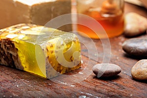 Handmade soap bar on wooden background