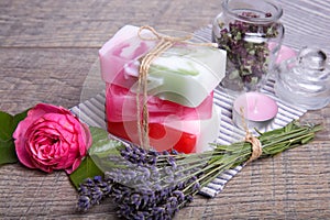 Handmade Soap with bath and spa accessories. Dried lavender and nostalgic pink rose