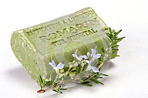 Handmade soap and a branch of rosemary.