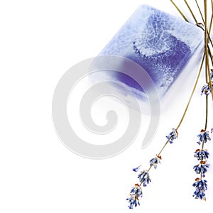 Handmade soap and dry lavender flowers isolated on white. There is free space for text