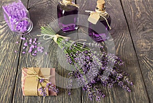 Handmade soap, lavender tincture, sea salt, on table