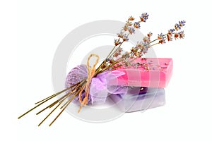 Handmade soap and sachet of lavender flowers isolated on white