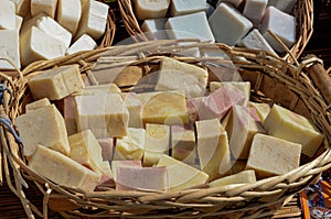 Handmade soap stacked in wicker basket
