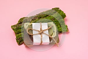 Handmade Soap on Wooden Bark Pink Background Minimal Horizontal Above