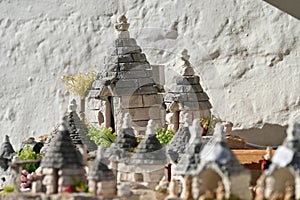 Handmade souvenir of trulli houses sold in a shop in Alberobello, Apulia - Italy