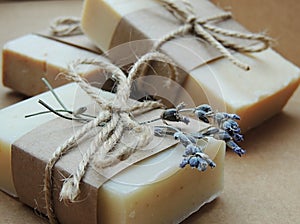 Handmade spa bath lavender soap on brown background. Soap making. Soap bar.