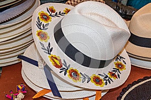 A handmade straw Panama hat, a Paja Toquilla hat with embroidered flowers on. Ecuador. photo