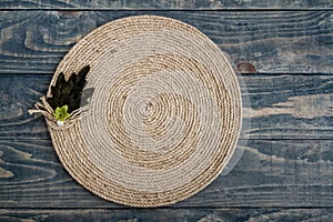Handmade Table Mat of Jute Rope Twisted in a Spiral Form photo