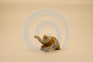 Handmade toy of small elefant on a light background