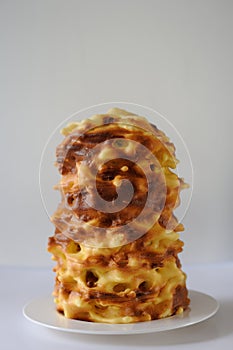 Handmade traditional baumkuchen layer cake baked over fire