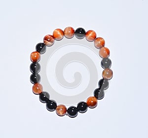 Handmade unique bracelet from tiger eye and onix mineral beads