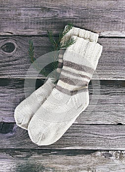 Handmade warm knitted socks of wool yarn