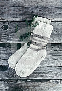 Handmade warm knitted socks of wool yarn