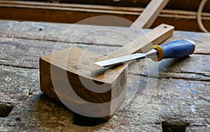 Handmade wood mallet and a sharp chisel