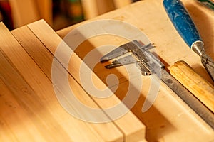 The handmade wood works with vernier callipers