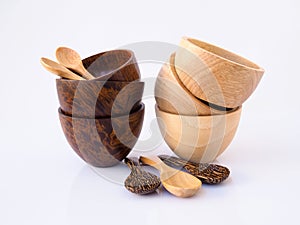 Handmade wooden dining set with cup, bowl and spoon, utensil for eating.