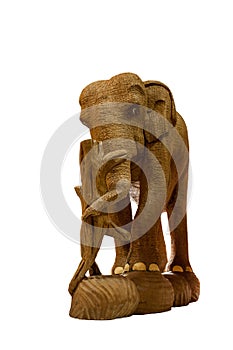 Handmade wooden elephant close-up on white background isolated