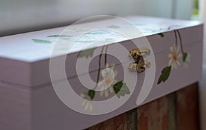 Handmade wooden jewelry box with a floral print