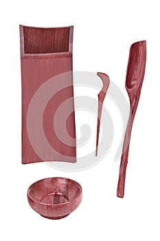 Handmade wooden kitchen utensils set on white background