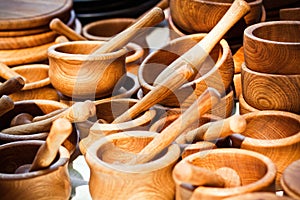Handmade wooden mortars and pestles on a market stall
