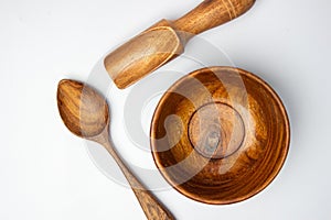 Handmade wooden spoon and bowl top view