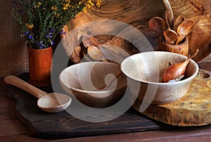 Handmade wooden utensils on the kitchen table.