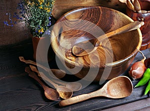 Handmade wooden utensils on the kitchen table.