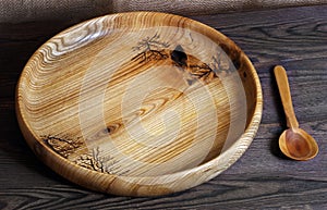 Handmade wooden utensils on the kitchen table.