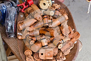 Handmade wooden whistles that mimic sounds of birds sold at handicraft fairs in Brazil.