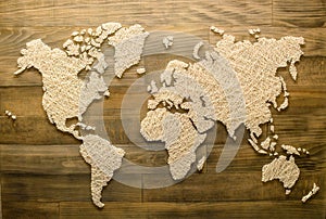 Handmade world map on wooden background for home decoration, top