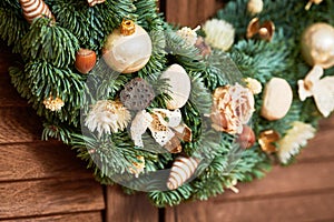 Handmade wreath from natural fir branches for decoration on and winter holidays. Christmas
