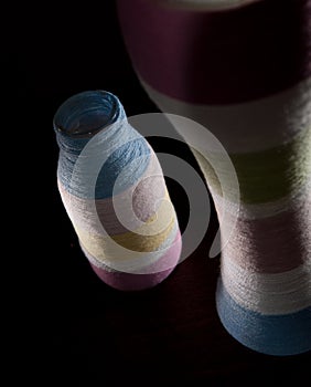 Handmade yarn wrapped glass bottles