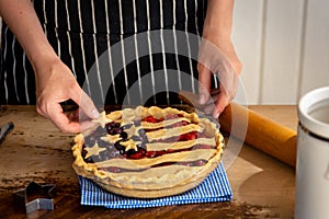 Handmaking a flag fruit pie photo