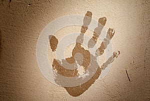 Handprint on the plastered wall. Stop concept. Toning