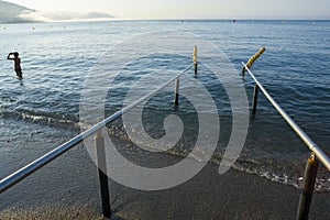 Handrails on beach for disabled people photo