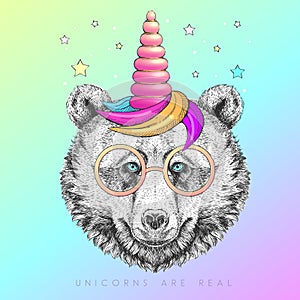 Handrawing animal bear wearing cute glasses with unicorn horn. T-shirt graphic print.