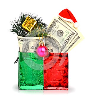 Handred dollars gift in pacage with christmas hat, bauble and pi